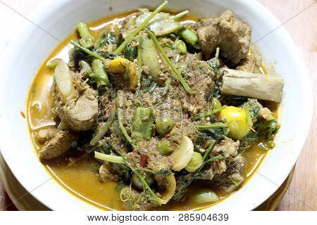 Northern Thai Spicy Curry With Pork And Mixed Vegetables And Thai Herbs With A Northern Spices In Wh