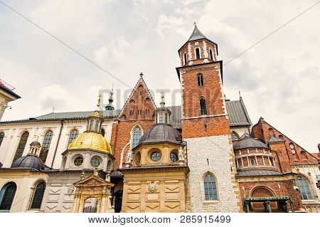 Royal Archcathedral Basilica With Gold Dome Chapel In Krakow, Poland On Cloudy Sky. Architecture, Te