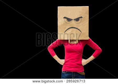 Angry Woman Carries Paper Bag Isolated On Black Background