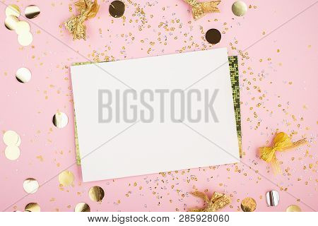 Blank Sheet Of Paper, Notebook On A Festive Pink Background With Golden Confetti And Glitter. Univer
