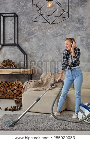 Full Length Portrait Of Cheerful Young Woman 20s Listening To Music Via Headphones And Having Fun Wi