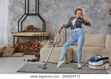 Full Length Portrait Of Cheerful Young Woman 20s Listening To Music Via Headphones And Having Fun Wi