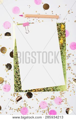 Blank Sheet Of Paper, Notebook On A Festive Pink Background With Golden Confetti And Glitter. Univer