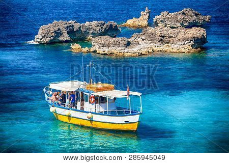 Comino, Malta - July 16: Sightseeing Boat At Blue Lagoon At Island Comino - Malta On July 16, 2015 I