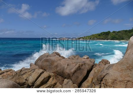 Waves Breaking On The Rocks In Seychelles