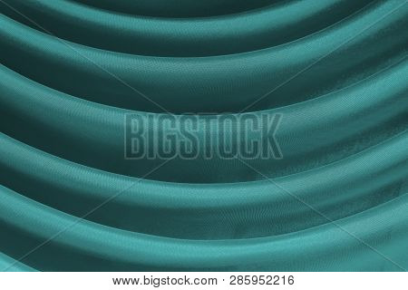 Horizontal Folds On Green Organza Curtains For Background And Design