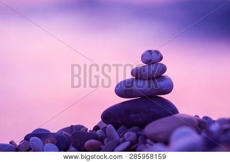 Stack Of Zen Stones On Pebble Beach