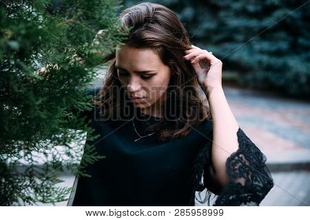 Beautiful Young Girl In The Park On A Summer Evening.