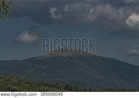 Big Mountains In Poland Near Cisna Town In Blue Sky Summer Day