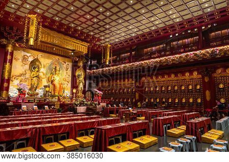 Singapore - 11 2018: Spiritual Atmosphere In Buddha Tooth Temple