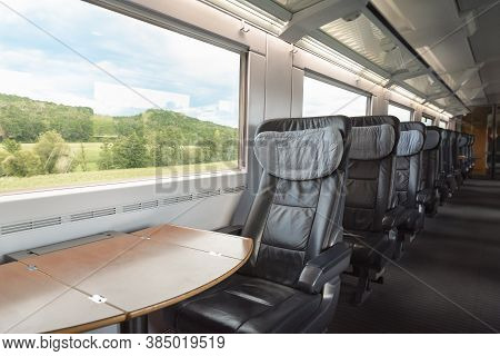 Intercity-express Train Interior With Empty Seats, At Business Class, In Motion. Inside Of High-spee