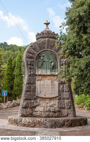 Lluc, Balearic Islands/spain; September 2020: Religious Sculpture Relief Made In Bronze On The Annun
