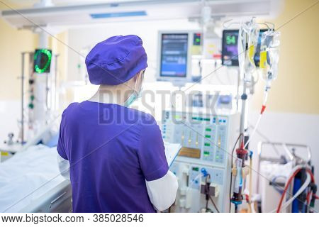 The Specialist Are Checking Continuous Renal Replacement Therapy Equipment And Injection Pump And He