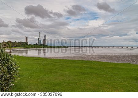 Panama City, Panama - November 30, 2008: Pan American Highway Over Brown Bay Waters Under Heavy Clou
