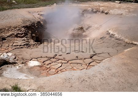 The Red Sprouter Mud Pot Geyser Along The Fountain Paint Pots Trail In Yellowstone National Park