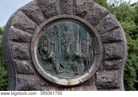 Lluc, Balearic Islands/spain; September 2020: Religious Sculpture Relief Made In Bronze On The Chris