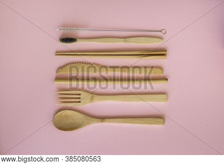 Eco Friendly Bamboo Cutlery Set In A Case On A Pink Background. Zero Waste Concept. Set Of Bamboo Cu