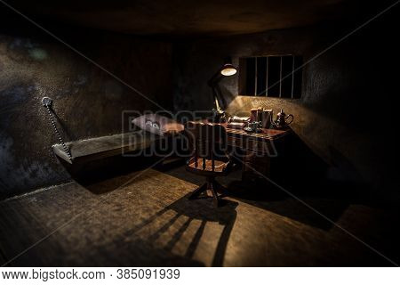 Jail Or Prison Cell. Man In Prison Man Behind Bars Concept. Old Dirty Grunge Prison Miniature. Dark