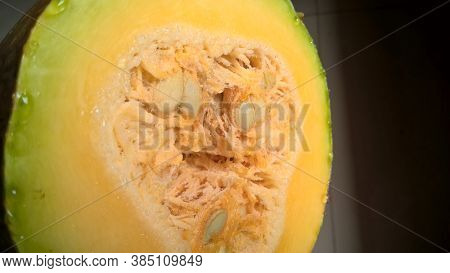 Closeup View Of Raw Vegetable Half Cut Pumpkin A Cultivar Of Winter Squash