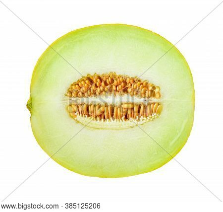 Half Of Ripe Melon With Seeds Isolated On White Background. Sweet Green Pulp Of Juicy Galia Melon. I