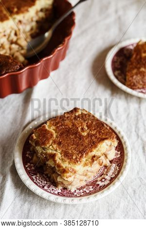 Apple And Cheese Cobbler Crisp. Cobbler Or Crumble Dessert With Apples In Ceramic Baking Form On Bei