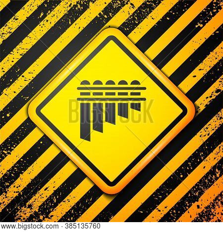 Black Pan Flute Icon Isolated On Yellow Background. Traditional Peruvian Musical Instrument. Zampona