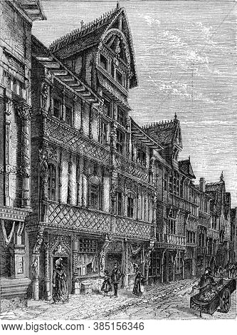 Lisieux wooden house. Vintage engraving. From Popular France, 1869.