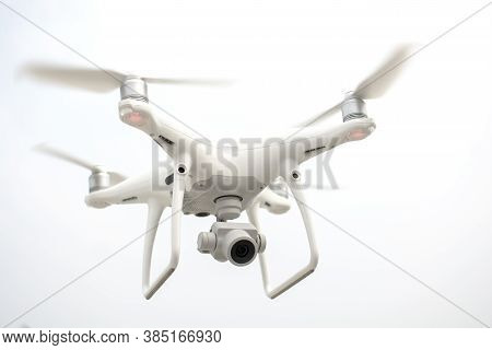 Drone Flying On White Sky Background, Motion Technolgoy