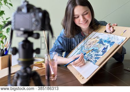 Artist, Teenage Girl, Draws Records On Video Camera For Blog. Paints, Drawings On Home, Camera On Tr