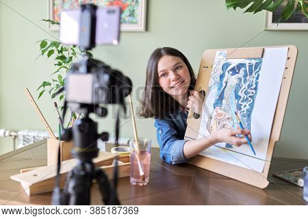 Artist, Teenage Girl, Draws Records On Video Camera For Blog. Paints, Drawings On Home, Camera On Tr