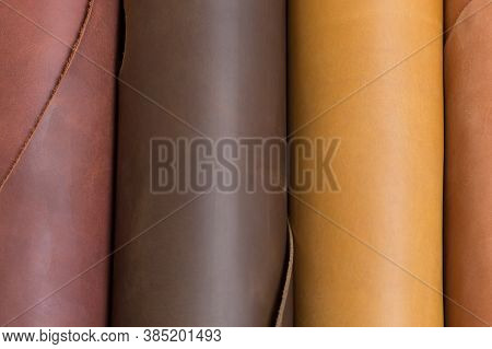 Brown And Light Brown Leather Rolls. Can Be Used As Background In Art Or Design Projects.