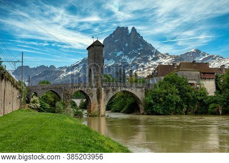 A Bridge Over River Gave De Pau In Orthez And Pic Du Midi Ossau - France