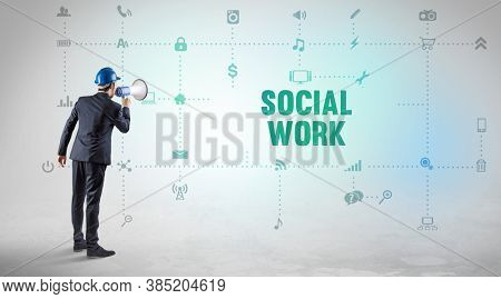 Engineer working on a new social media platform with SOCIAL WORK inscription concept
