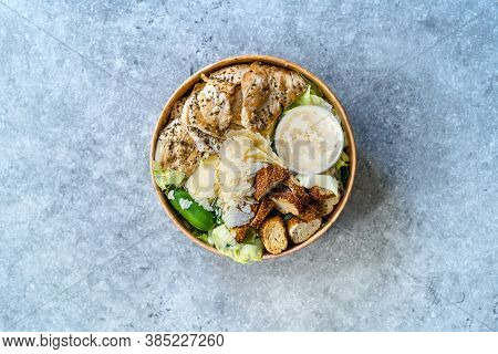 Take Away Healthy Organic Ceaser Salad With Chicken, Parmesan Cheese, Crouton Bread And Yogurt Mayon