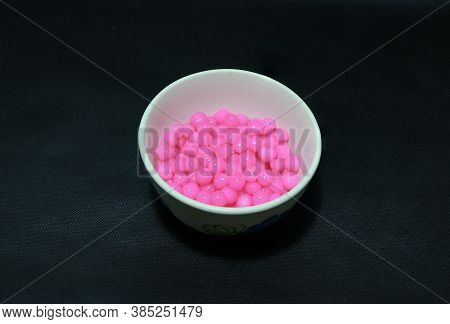 Pink Sago With Syrup In The Circle Bowl On The Black Floor . Sago, It Can Edible Starch That Is Obta