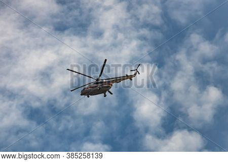 Mi-8 Helicopter Emercom Of Russia In The Sky. View From The Ground