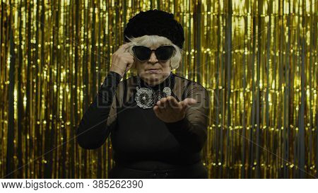 Displeased Annoyed Senior Old Woman Showing Stupid Gesture, Accusing Crazy Cuckoo Mind, Blaming Insa