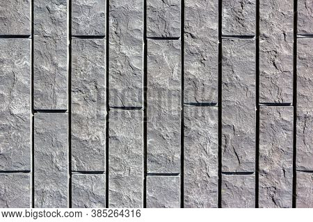Grey Wall Tiles Imitating Brickwork. Modern Finishing Material. Gray Facade Facing Tiles, Imitating 