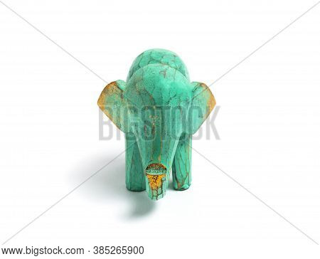 Figurine Of A Green Wooden Elephant With Gilding Isolated On White Background. Decorative Figurine O
