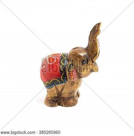 Figurine Of A Wooden Elephant With Pattern On The Back Isolated On White Background. Decorative Figu