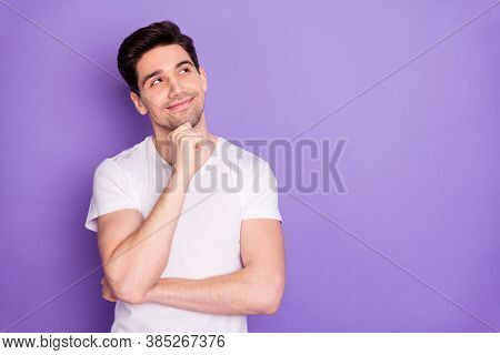 Photo Of Attractive Handsome Guy Good Mood Arm On Chin Dreamer Look Interested Empty Space Intellige