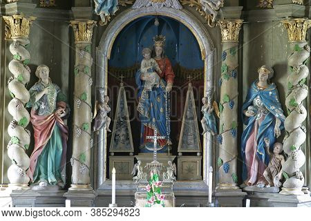 RADOBOJ, CROATIA - SEPTEMBER 21, 2014: Altar of Our Lady of the Snows in the parish church of the Holy Trinity, Radoboj, Croatia