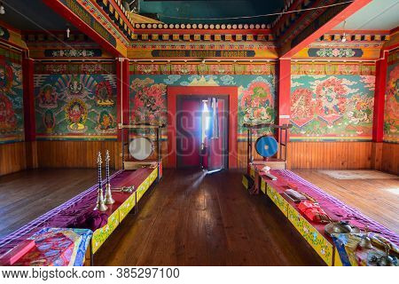 Rinchenpong, Sikkim, India - 17th October 2016 : One Young Lama Opening The Door And Bringing In Lig