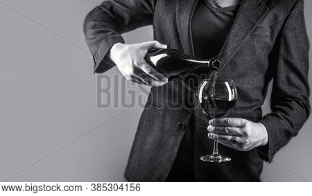 Gourmet Drink Bottle, Red Wine Glass, Sommelier, Tasting. Waiter Pouring Red Wine In A Glass. Sommel