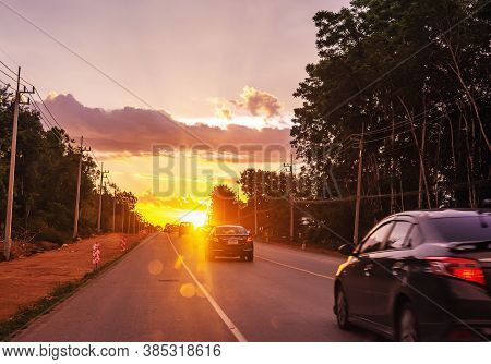 Pattalung, Thailand - August 29, 2020 : Car On Road With Colorful Of Sunset Or Sunrise In Twilight