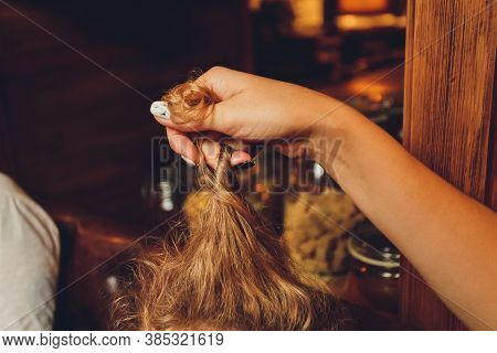 Combing With Brush And Pulls Long Hair. Daily Preparation For Looking Nice, Long Disheveled Hair, Ho