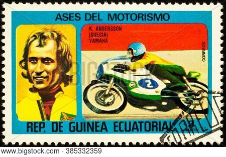 Moscow, Russia - September 14, 2020: Stamp Printed In Equatorial Guinea Shows Racing Motorcyclist An