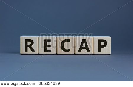 The Word 'recap' On Wooden Cubes On Beautiful Grey Background, Copy Space. Business Concept.