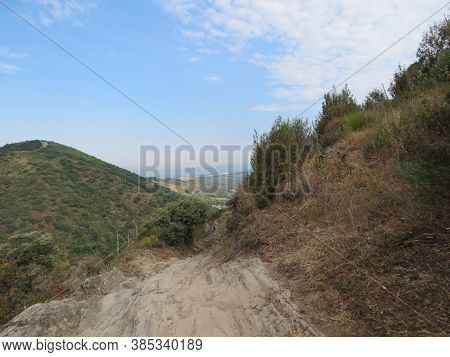 Camino De Santiago Path Going On Natural Slate Stones In Montes De Leon - Leon Mountains - Near El A