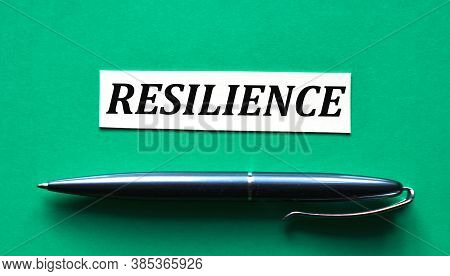 Resilience - Word On A Green Background With A Black Handle